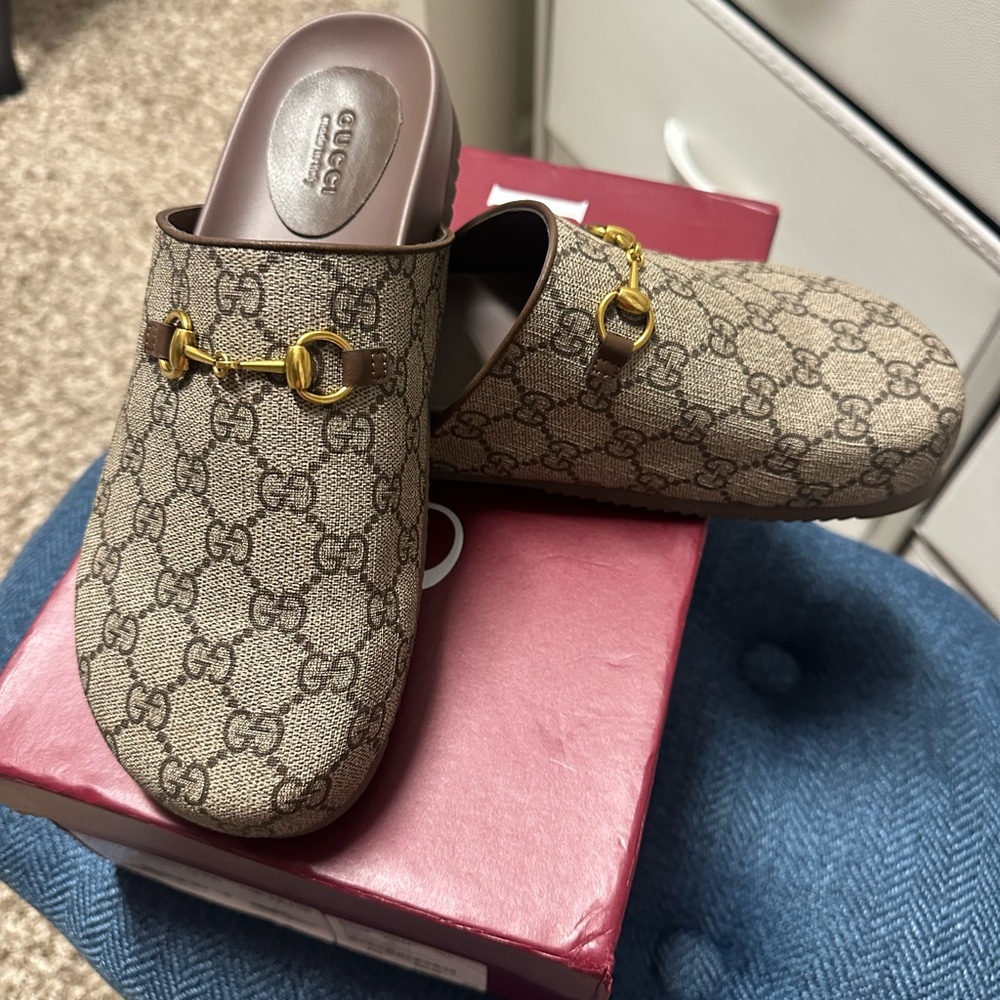 Gucci Women's Beige Monogram Mules with Gold Accents